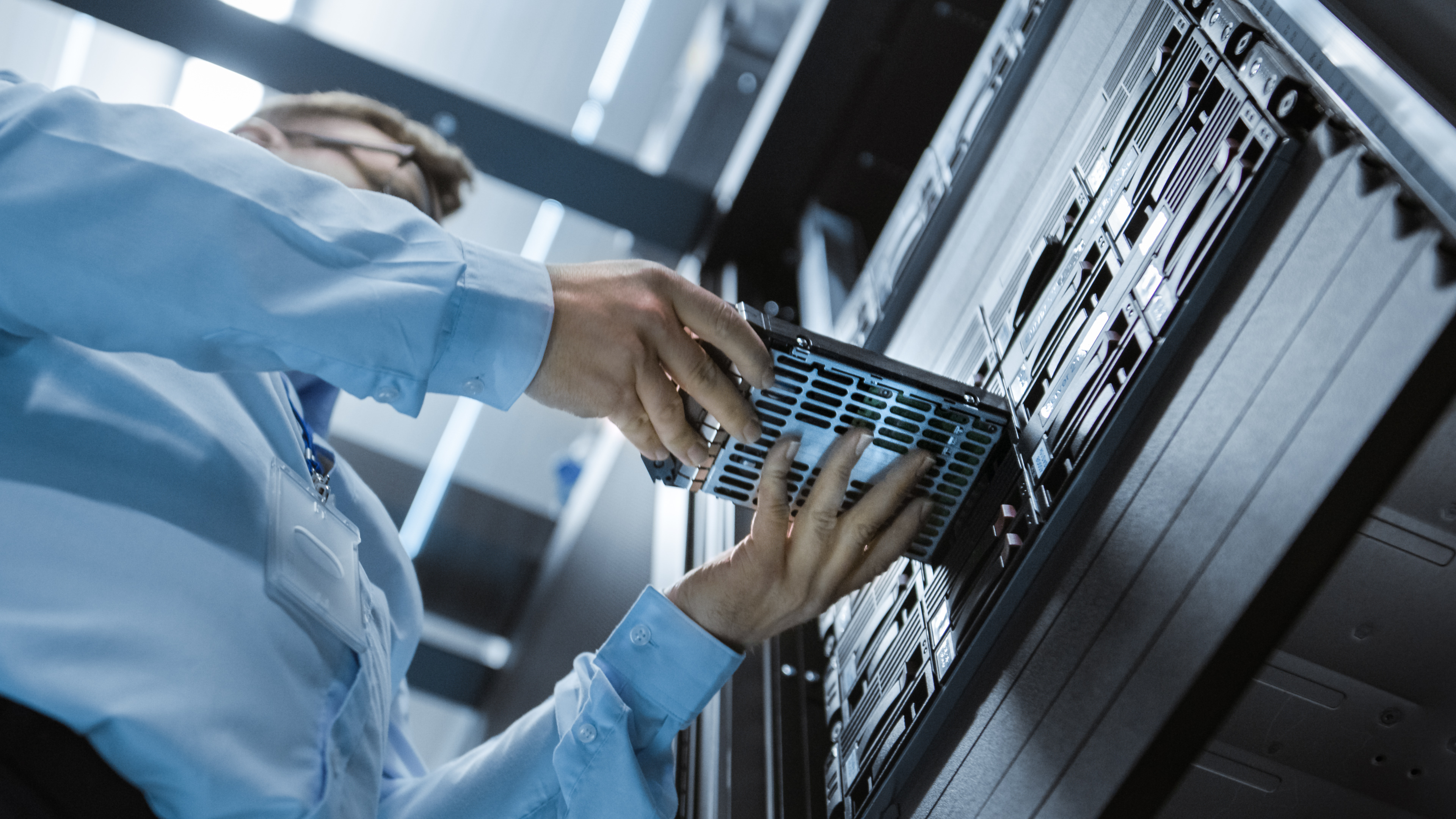 OT managed services engineer monitoring industrial control systems for lifecycle governance